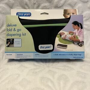 First years deluxe gold and go diapering kit attaches to stroller wipes case